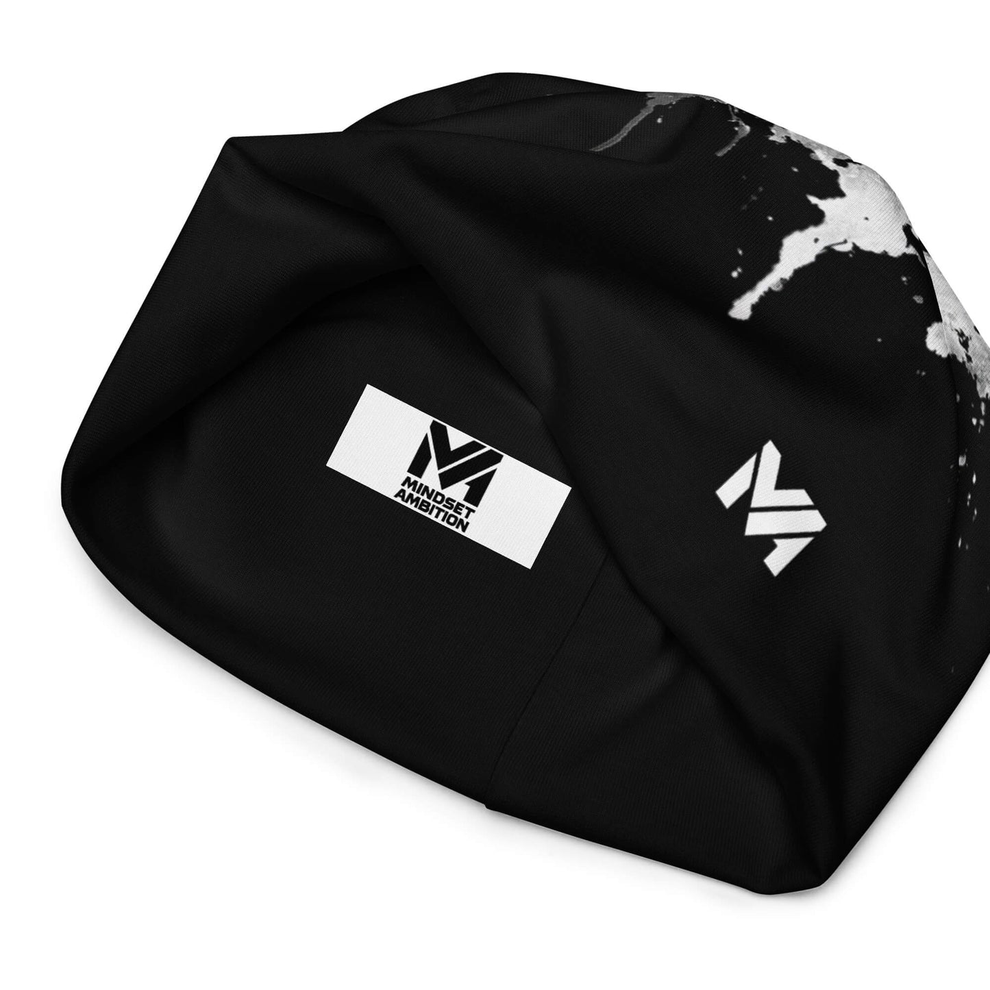 Bonnet Flow Drip Mindset Ambition, version noire ornée d’un motif peinture blanche fluide et du logo imprimé blanc, vue intérieure contrastée mettant en avant l’identité Mindset Ambition – Mindset Ambition