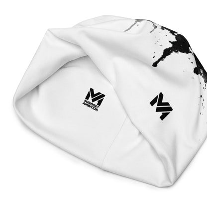 Bonnet Flow Drip Mindset Ambition, version blanche avec éclaboussures de peinture noire et logo imprimé noir, vue intérieure du bonnet affichant la signature Mindset Ambition – Mindset Ambition
