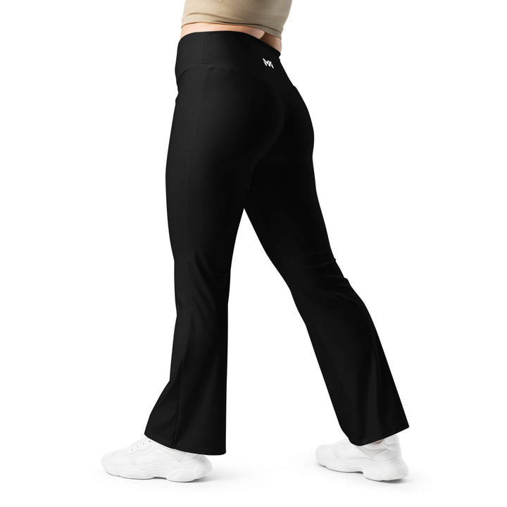 Leggings femme Timeless Grace Mindset Ambition, couleur noire, coupe évasée et taille haute, logo blanc centré en haut du dos au-dessus des fesses, vue de dos, collection Force & Élégance.
