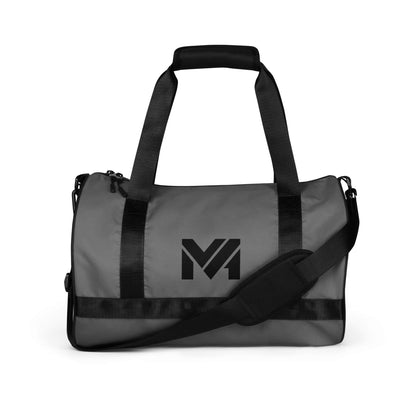 Sac de sport Smart Move Mindset Ambition, gris, vue de côté posée, logo noir centré sur le panneau principal.