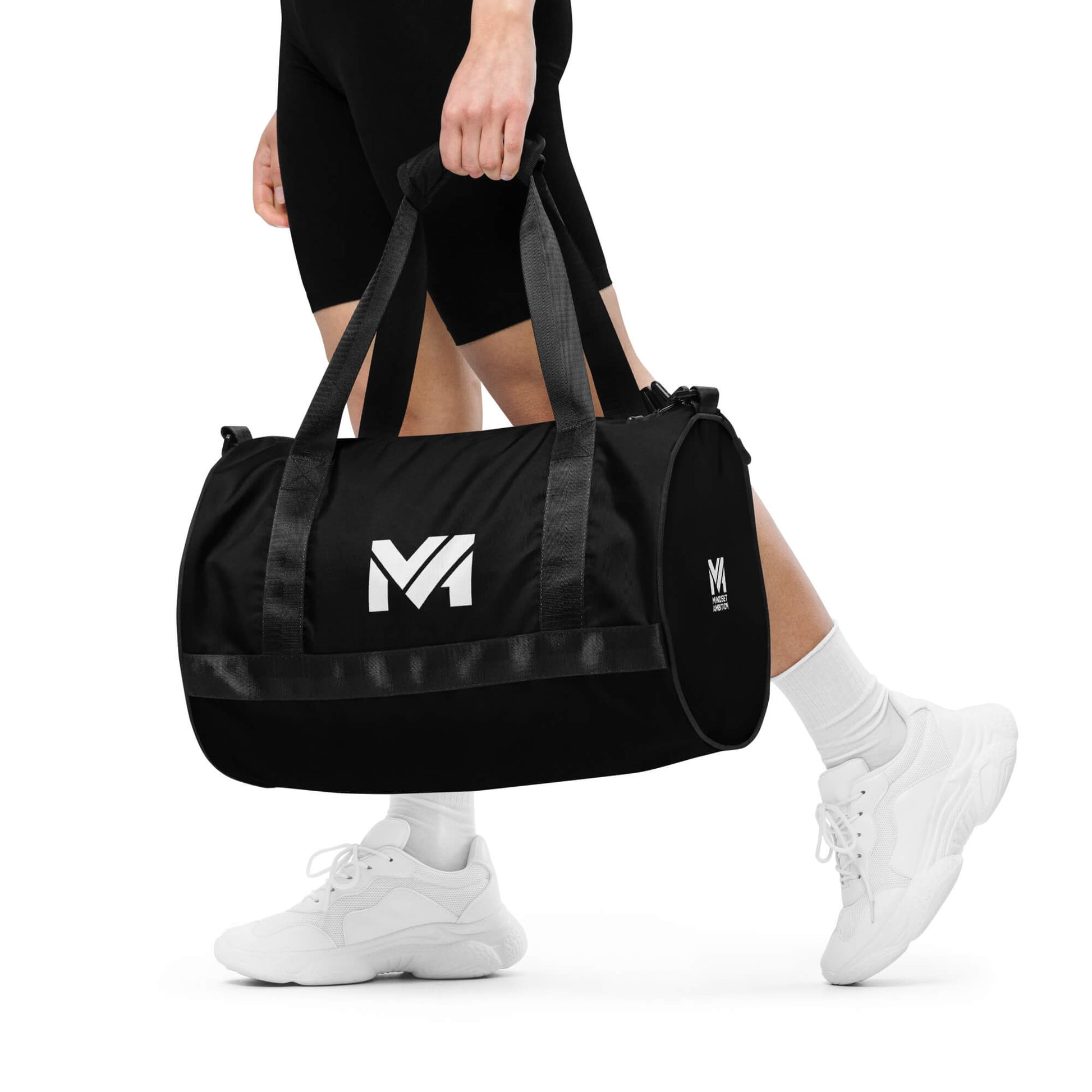 Sac de sport Smart Move Mindset Ambition, noir, porté à la main, logo blanc centré sur le côté.